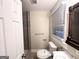 Clean bathroom featuring new toilet, shower, and sink at 2965 Meadowview Se Dr, Atlanta, GA 30316