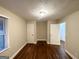 Spacious bedroom featuring wood floors, a ceiling light, and neutral paint at 2965 Meadowview Se Dr, Atlanta, GA 30316