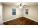 Bedroom featuring hardwood floors, modern ceiling fan, and natural light at 2965 Meadowview Se Dr, Atlanta, GA 30316