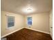 Bedroom featuring hardwood floors, natural light, and a view from the window at 2965 Meadowview Se Dr, Atlanta, GA 30316