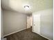 Bedroom with carpet, grey paint, and closet space at 3798 Bakers Ferry Sw Rd, Atlanta, GA 30331