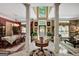 Spacious foyer with marble floors provides access to the formal dining and living areas, featuring elegant columns and natural light at 608 Wingspread, Peachtree City, GA 30269