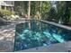 Backyard swimming pool and lounge area at 608 Wingspread, Peachtree City, GA 30269