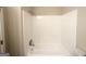 Clean, bright bathroom featuring a white tiled shower and tub with chrome fixtures at 3865 Lehigh Blvd, Decatur, GA 30034