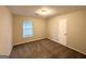 Bedroom with neutral paint, carpet flooring and natural light from a window at 3865 Lehigh Blvd, Decatur, GA 30034