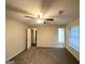 Bedroom featuring neutral colored walls, carpet, and a ceiling fan at 3865 Lehigh Blvd, Decatur, GA 30034