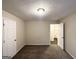 Bedroom with neutral paint, carpet flooring, and two closets at 3865 Lehigh Blvd, Decatur, GA 30034