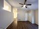 Bright living room with wood floors, neutral paint, and entry door with sidelights at 3865 Lehigh Blvd, Decatur, GA 30034
