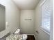 Bathroom featuring a granite countertop vanity and a toilet with a dark floor at 4140 Pierce Rd, South Fulton, GA 30349