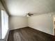 Bright living room featuring dark wood floors and a modern ceiling fan at 4140 Pierce Rd, South Fulton, GA 30349