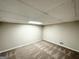 Finished basement offers neutral carpet, painted walls, and recessed lighting at 4505 Wonder Valley Trl, Decatur, GA 30034