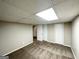 Finished basement area features neutral carpet and a large closet at 4505 Wonder Valley Trl, Decatur, GA 30034