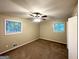 This bedroom has windows and a ceiling fan for comfort at 4505 Wonder Valley Trl, Decatur, GA 30034