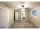 This bedroom features a ceiling fan and a view of the bathroom at 4505 Wonder Valley Trl, Decatur, GA 30034