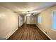 Bright living room offers wood floors, neutral walls, and natural light at 4505 Wonder Valley Trl, Decatur, GA 30034