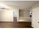 Spacious living room featuring updated flooring and neutral paint, creating a bright and inviting space at 4505 Wonder Valley Trl, Decatur, GA 30034