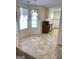Eat-in kitchen features light-colored cabinets, stainless appliances, and a cozy dining nook with natural light at 3041 Regal Dr, Mcdonough, GA 30253