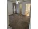 Main bedroom features neutral carpet, a ceiling fan, and an en suite bathroom and closet at 3041 Regal Dr, Mcdonough, GA 30253