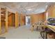 Unfinished basement with exposed ducts, window, and workbench at 125 Anna Dr, Covington, GA 30014