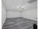 Finished basement with neutral walls, recessed lighting, and vinyl floors at 125 Anna Dr, Covington, GA 30014
