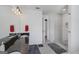 This bathroom offers dual sinks, granite counters, and a stylish glass-enclosed shower at 125 Anna Dr, Covington, GA 30014