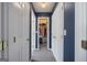 A hallway with closet doors showing closet space at 125 Anna Dr, Covington, GA 30014