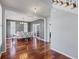 Elegant dining room with hardwood floors, a chandelier, and ample seating for Gathering gatherings and entertaining guests at 125 Anna Dr, Covington, GA 30014