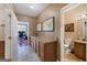 Entry area with powder room, granite countertops and access to the office at 125 Anna Dr, Covington, GA 30014