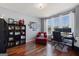 Bright home office with hardwood floors, large windows and a view of the yard at 125 Anna Dr, Covington, GA 30014