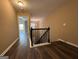Hallway leading to living areas with vinyl flooring at 1853 Broad River Rd, Atlanta, GA 30349