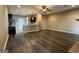 Open floor plan, view of kitchen, modern lighting, and hardwood floors at 1853 Broad River Rd, Atlanta, GA 30349