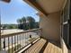 Relaxing outdoor patio with a view of trees, a parking lot, and the sky at 1853 Broad River Rd, Atlanta, GA 30349