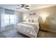 Inviting bedroom featuring a cozy bed, soft lighting, elegant decor, and a peaceful ambiance at 15 Dayton Way, Sharpsburg, GA 30277