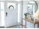 Bright entryway featuring modern decor, a stylish mirror, and a welcoming ambiance at 15 Dayton Way, Sharpsburg, GA 30277