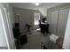 Home office/bedroom with carpet, a desk, an office chair, and a sound system at 3015 Cranbrook Nw Walk, Kennesaw, GA 30144