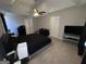 Neutral main bedroom with a tray ceiling and fan and including a closet at 3015 Cranbrook Nw Walk, Kennesaw, GA 30144