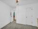 Neutral bedroom with a view into an adjacent room at 1326 Harmony Grove Church Rd, Auburn, GA 30011