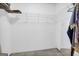 Walk-in closet with storage and mirror at 1326 Harmony Grove Church Rd, Auburn, GA 30011