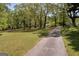 Long private driveway leading to the charming home at 1326 Harmony Grove Church Rd, Auburn, GA 30011