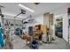 Garage with ample storage, workbench and overhead lighting, perfect for projects and organization at 1326 Harmony Grove Church Rd, Auburn, GA 30011