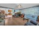 Inviting living room with hardwood floors, a fireplace, and ample seating area at 1326 Harmony Grove Church Rd, Auburn, GA 30011