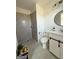 Well-appointed bathroom with a walk-in shower, sleek vanity, and contemporary fixtures for a modern look at 2873 Shoals Hill Ct, Dacula, GA 30019