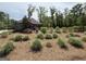 Manicured landscaping surrounding the community pool and other neighborhood amenities at 2873 Shoals Hill Ct, Dacula, GA 30019