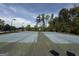 Dual tennis courts, lined and ready for a match at 2873 Shoals Hill Ct, Dacula, GA 30019