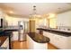 Spacious kitchen featuring an island, stainless steel appliances, and white cabinets at 109 Windsong Dr, Stockbridge, GA 30281