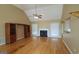 Bright living room featuring a fireplace, hardwood floors, and neutral walls at 109 Windsong Dr, Stockbridge, GA 30281