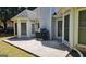 This home has a stone patio area with a grill, easily accessible from the home at 109 Windsong Dr, Stockbridge, GA 30281