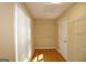 Efficient walk-in closet with shelving, door and natural light from window at 109 Windsong Dr, Stockbridge, GA 30281