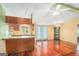 Bright living room with hardwood floors and seamless flow to the dining area with natural light at 73 Highpoint Ln, Locust Grove, GA 30248
