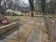 Fenced backyard featuring a shed and potential for gardening or recreation, offering privacy and space at 502 S Evelyn Nw Pl, Atlanta, GA 30318